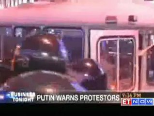 Putin slams Clinton for encouraging protesters