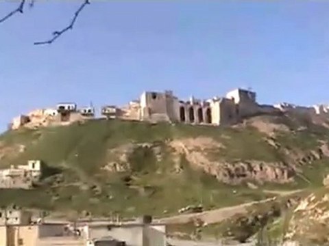 فري برس ريف حماه المحتل قذيفة سقطت على قلعة المضيق 25 3 2012