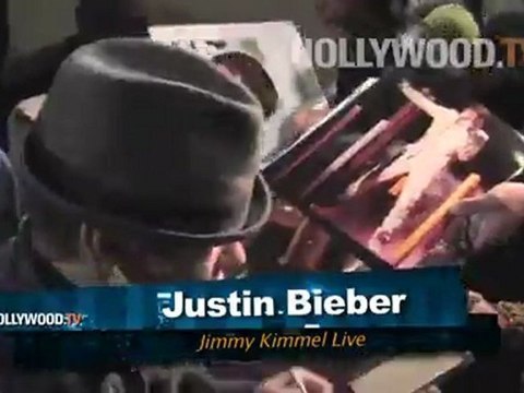 Justin Bieber and Ashton Kutcher sign autographs at Jimmy Kimmel Live