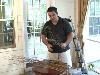 Adding Curly Willow to the Grapevine Garland
