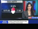 Asian markets in green on global cues