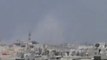 فري برس   تصاعد الدخان من حي دير بعلبة بسبب قصف الحي من قبل عصابات بشار الأسد 3 4 2012 ج2