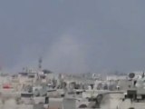 فري برس   تصاعد الدخان من حي دير بعلبة بسبب قصف الحي من قبل عصابات بشار الأسد 3 4 2012 ج2