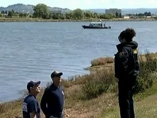 Divers search for Oakland shooting gun