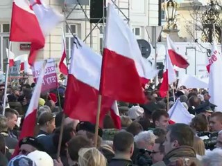Poland marks president's plane crash anniversary as doubts rage