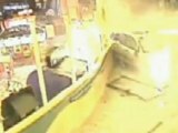 CCTV: Woman smashes car into Manchester bowling alley