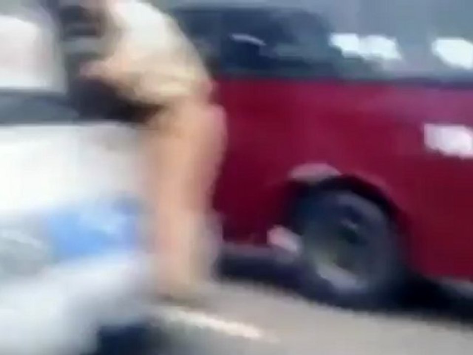 Hanoi traffic cop takes an unexpected bus ride