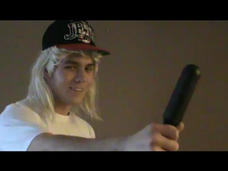 Justin Bieber gets punched hard by reporter.