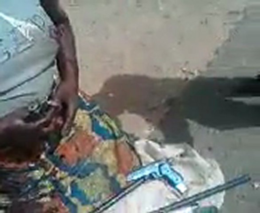 Woman caught with guns inside garri bags
