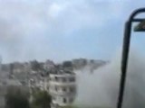 Syrian forces shell Homs despite ceasefire