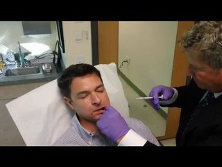 Dr. Adams Injects Radiesse In The Chin of A Patient
