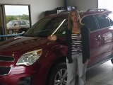 Barry Sanders Honda Employee Ashley Walks Around Used Chevrolet Equinox SUV in Stillwater OK