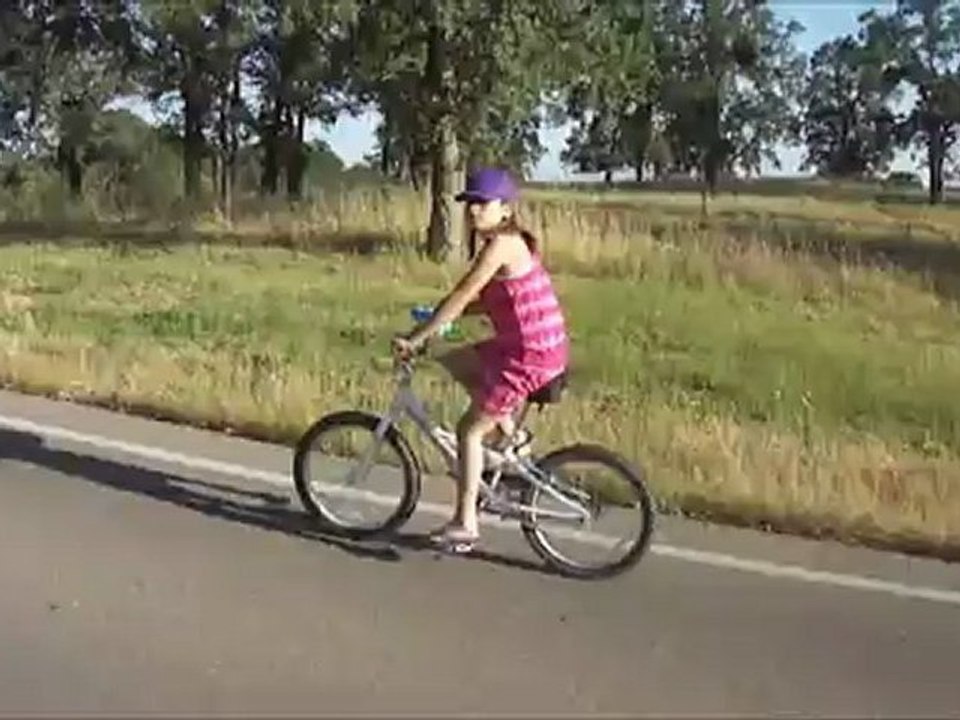 Karissa riding bike at Lake Camanche