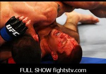 Matt Brown vs Stephen Thompson grapple during