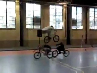 Insane Bike Trick Over Two People