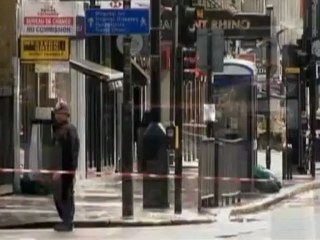 Police seal off street in central London siege