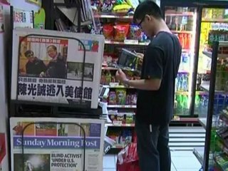 Holed up activist grabs attention of Chinese.