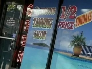 Bronzed mother denies tanning 5 year old child