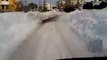 Strada sommersa dalla neve