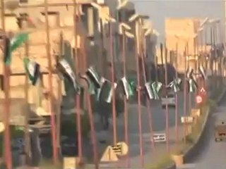 فري برس  ادلب بنش  اعلام الاستقلال تزين مداخل المدينة الرئيسية 6 5 2012 Idlib