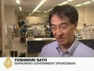 Japan's tsunami victims stuck in monsoon limbo