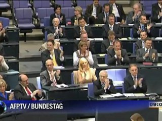 Germany's Merkel warns no 'magic bullet' to beat crisis