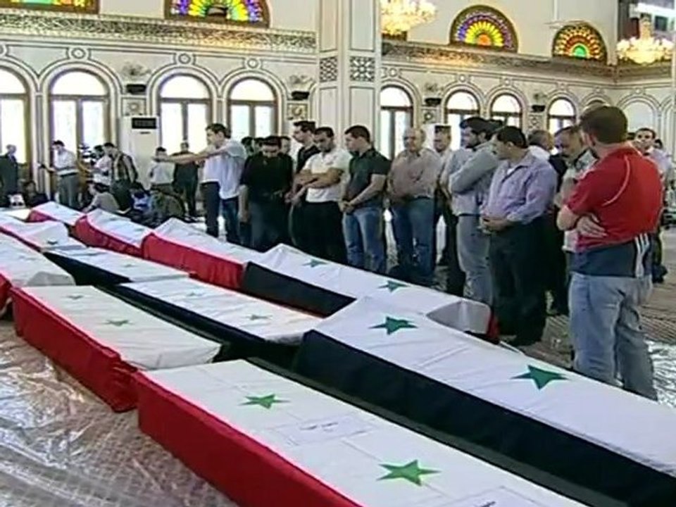 Syrians protest at blast victims' funeral