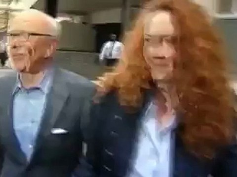 Ex-Murdoch editor charged over hacking scandal