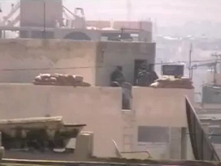 Syria فري برس حماة المحتلة  إعتلاء القناصة لبرج الدفاع المدني  18 5 2012 Hama