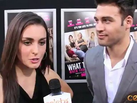 Kathryn McCormick and Ryan Guzman at the What To Expect Premier
