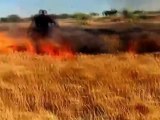 Syria فري برس ادلب احتراق المحاصيل الزراعية بسبب القصف الصاروخي على قرية معرشمارين22 5 2012 Idlib