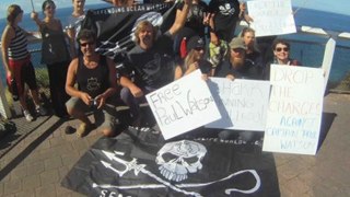 Sea Shepherd Paul Watson SOS action Byron Bay light house