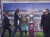Topless woman tries to steal Euro 2012 cup