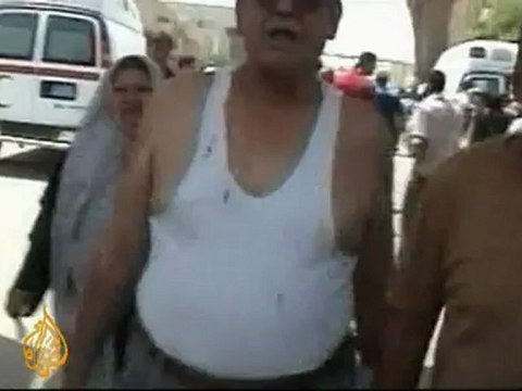 Scores dead as blasts strike central Baghdad - 19 Aug 09
