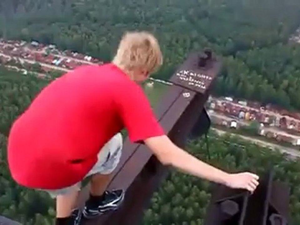 Crazy guy walks on the top of a very high  (MUST SEE!!!)