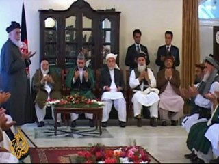 President Karzai begins bid for talks with Taliban