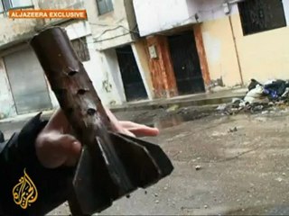 Homs residents in 'war zone'