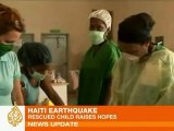 Boy found alive under Haiti ruin