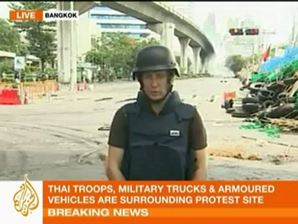 Thai troops breach red shirts' barricades