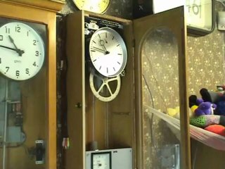 Master clock pendulum synchroniser