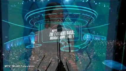 "Twilight," "Hunger Games" win at MTV Movie Awards, Spike TV honors guys' films