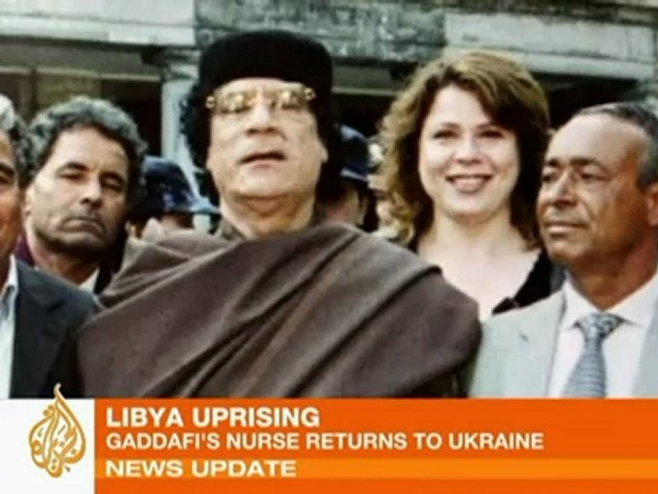 Gaddafi's 'voluptuous blonde' returns home