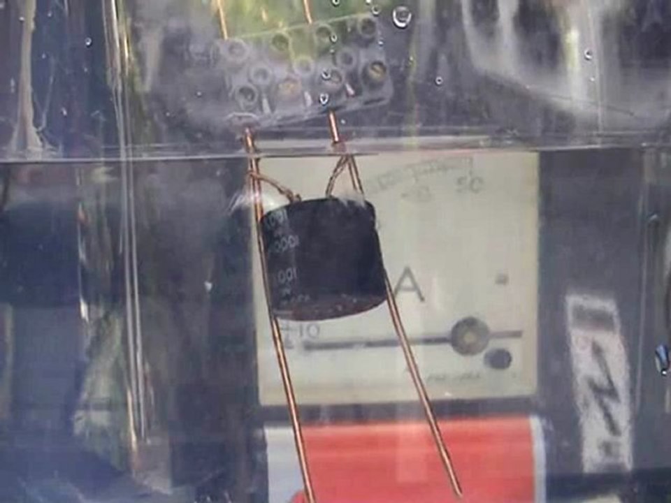Capacitor blows bubbles