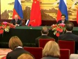 Russia's Putin, China's Hu urge support for Annan's Syria plan