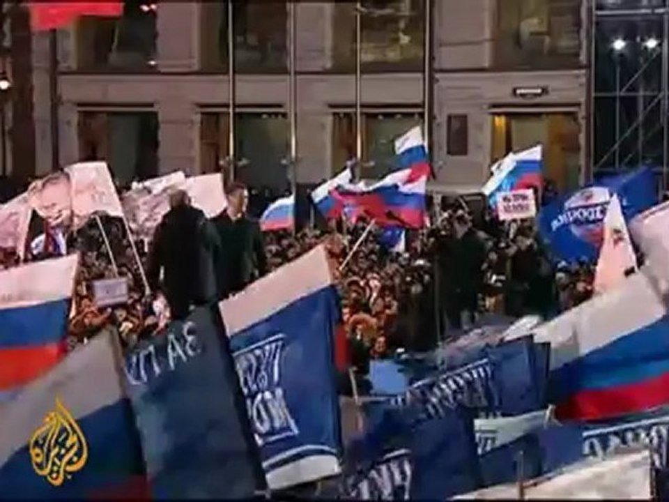Putin declares victory before thousands