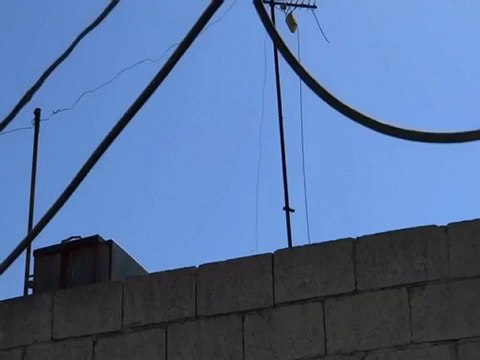 Syria فري برس حمص تلبيسة قصف الأحياء السكنية بالطيران الهيلوكبتر 7 6 2012 Homs