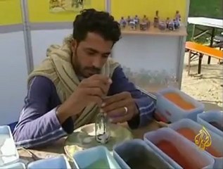 أعمال الملتقى العالمي للنحت على الرمال