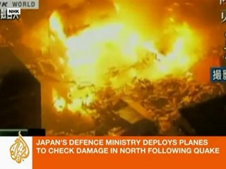Twin disasters overwhelm Japan