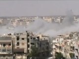 Syria فري برس حمص الخالدية لحظة سقوط الصواريخ وتصاعد الدخان9 6 2012 Homs