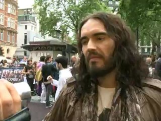Russell Brand throws journalist's video camera into crowd